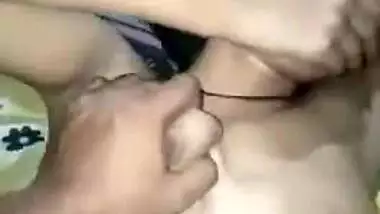 Guy squeezes a 19-year-old nude girl’s juicy boobs