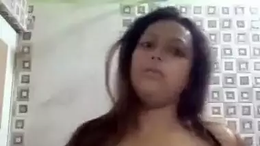 Sexy booby Bengali girl standing topless in bathroom