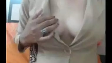 Topless hottie having fun in her office