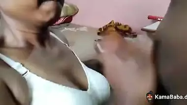 Desi lady gives a handjob to her husband and swallows cum