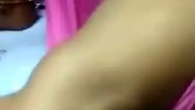 Relaxed Desi aunty lies on the bed with her sweet XXX vagina exposed