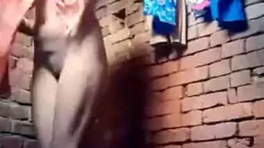 Attractive Desi village girl displays XXX assets while bathing nude